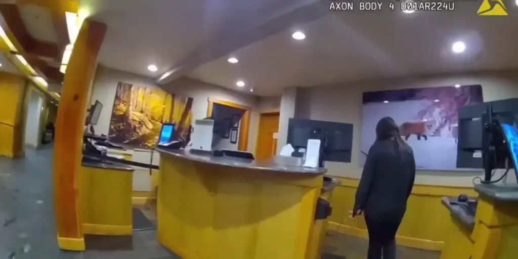 Police bodycam footage showing a bear inside a luxury hotel lobby.