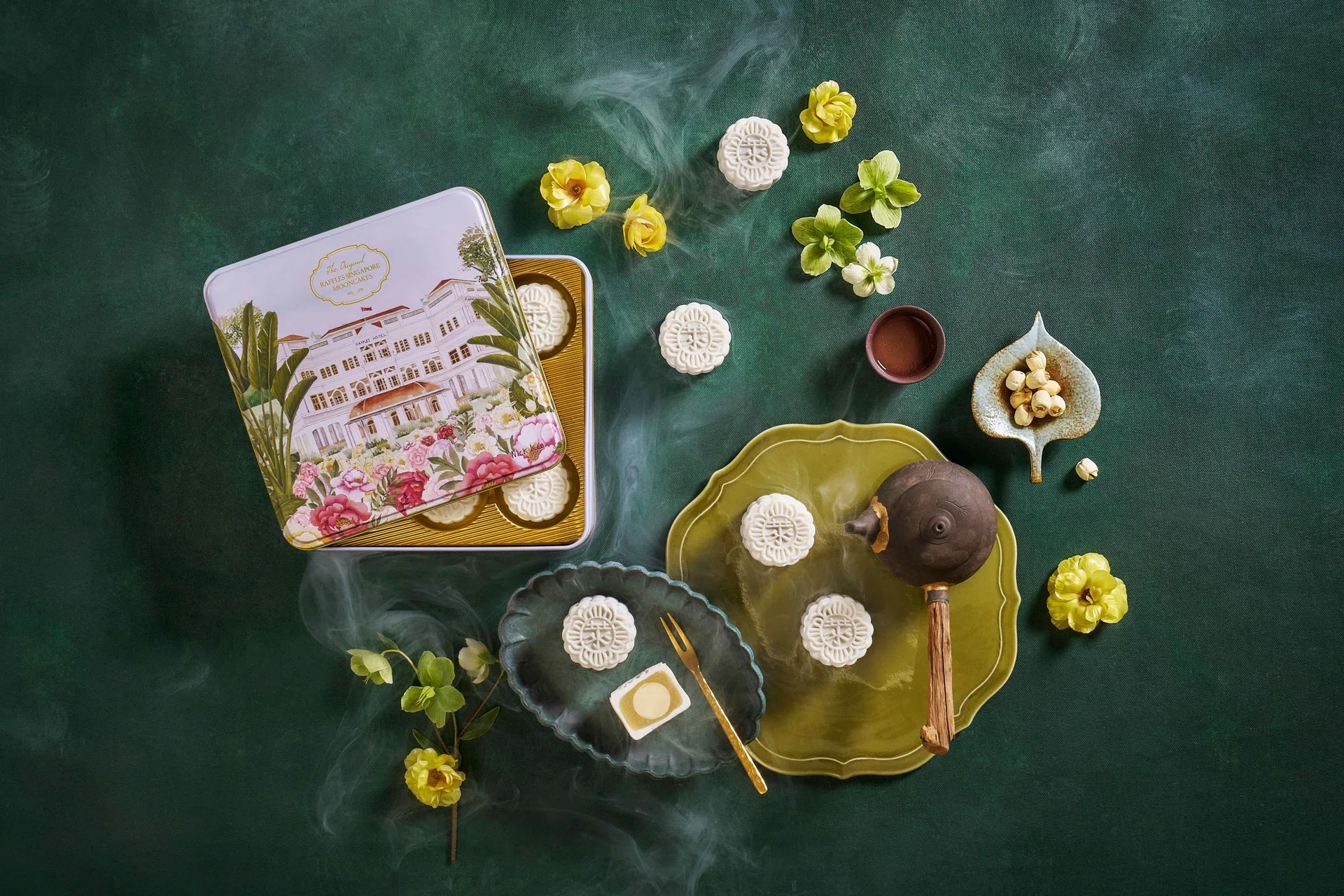 An ornate box of Champagne Truffle Snowskin Mooncakes from Raffles Hotel Singapore.