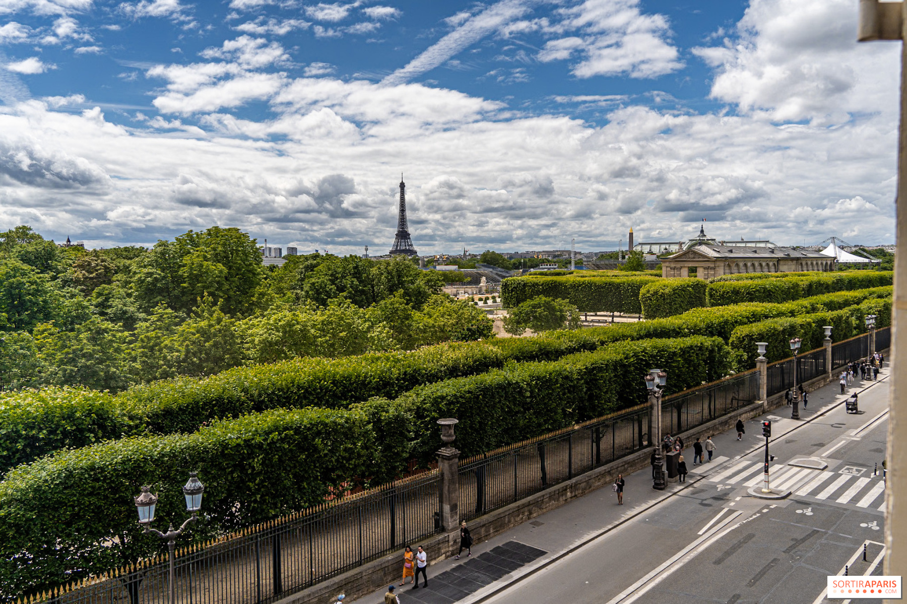 An aerial view of the Rue de Rivoli, Paris, with the Tuileries Garden prominently featured, hinting at the location of the new luxury hotel.