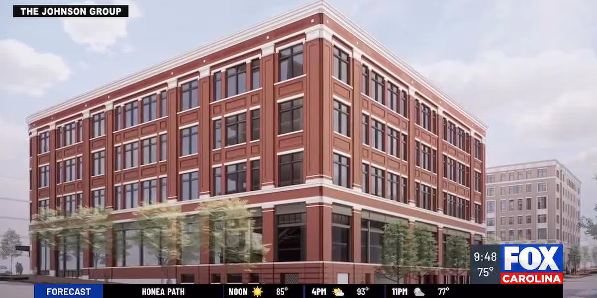 A modern, sleek luxury hotel building with large windows and upscale architectural details, set in an urban downtown environment.