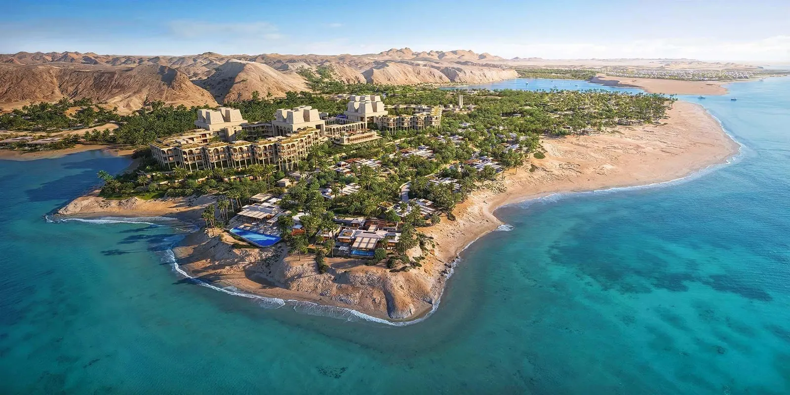 Vue extérieure de luxueuses villas sur pilotis avec piscines privées, donnant sur un océan serein.