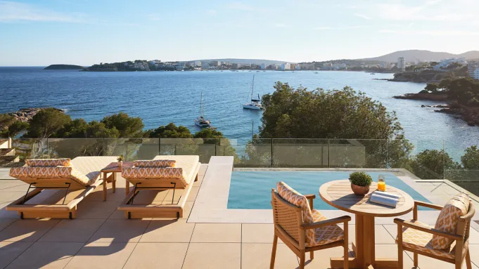 Exterior view of Mandarin Oriental Punta Negra, Mallorca, showing a suite terrace overlooking the sea