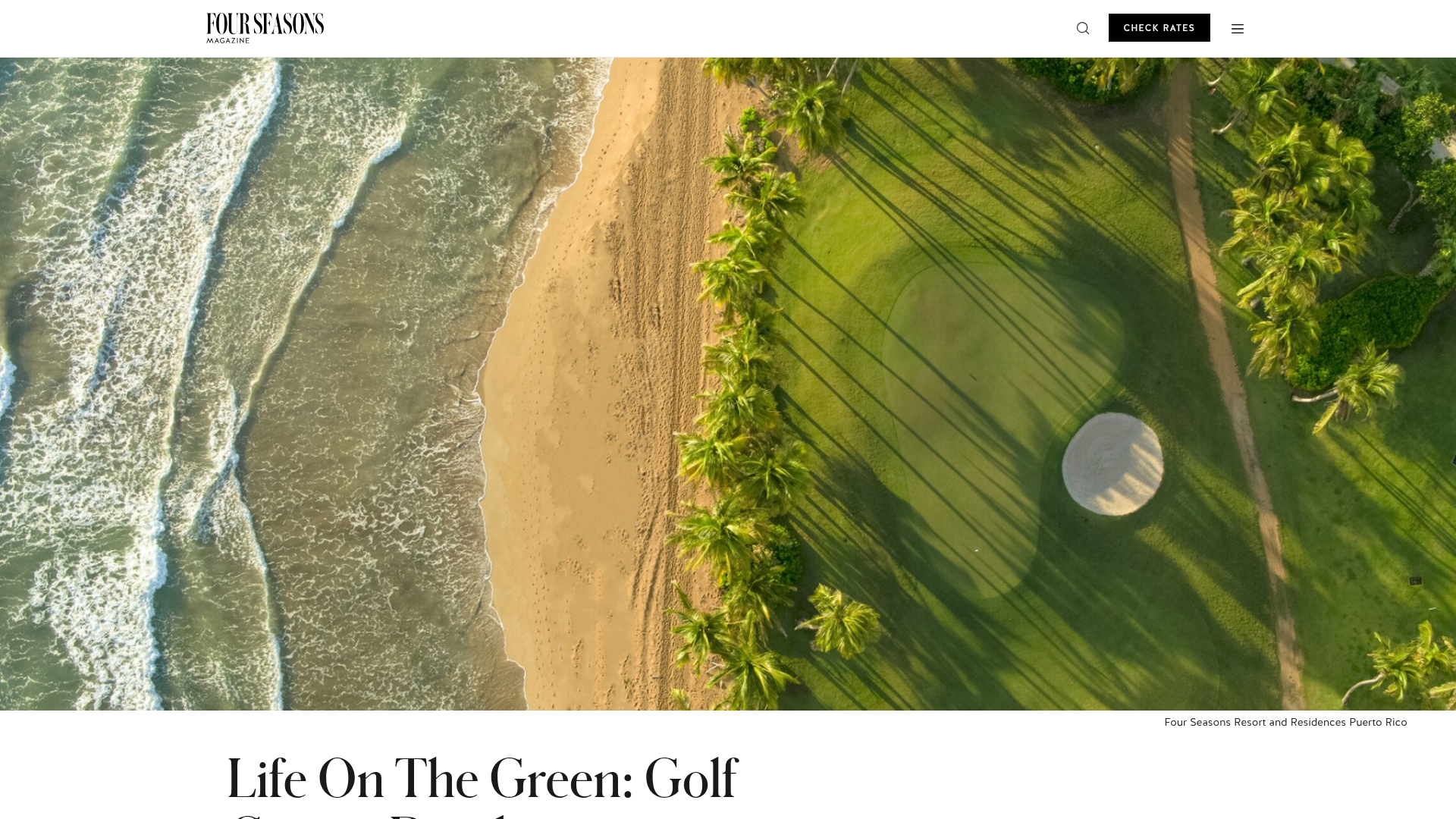 Aerial view of a golf course winding through a tropical Four Seasons resort with oceanside residences