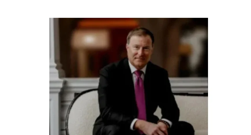 Roland Fasel, newly appointed President of Capella Hotel Group, smiling professionally.