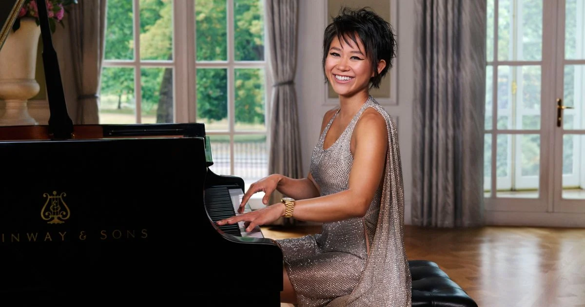 Promotional image featuring pianist Yuja Wang and DJ Charlotte de Witte, likely in a luxurious Mandarin Oriental setting, perhaps with a subtle fan motif.