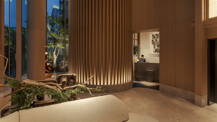 Elegant hotel lobby with modern wooden decor and natural lighting, featuring warm wood accents and stylish design elements.